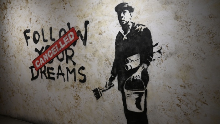 Revelan la verdadera identidad del artista callejero Banksy